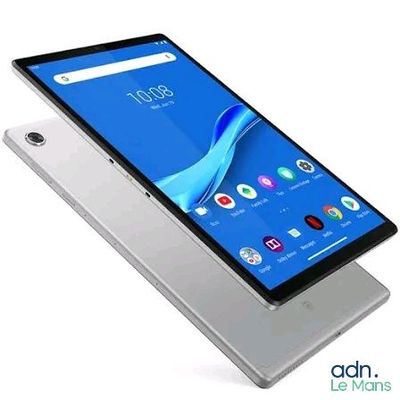 a close up of a tablet with a phone on top of it