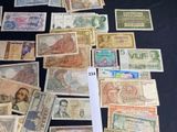 many different types of currency on the table