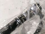 a microphone wrapped in plastic sitting on a counter