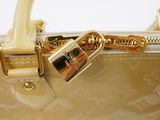 a close up of a purse with a lock on it