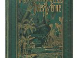 un livre vert avec des lettres dorées sur la couverture
