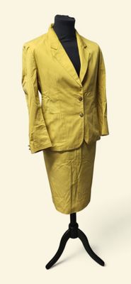 an image of a yellow suit on a mannequin