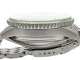 an image of a close up of a watch on a white surface