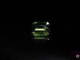 an image of a green crystal stone in the dark
