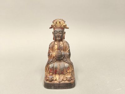 CHINE, XXème siècle. Dignitaire assis tenant une tablette Hu…