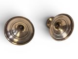 pair of antique brass door knobs on a white background