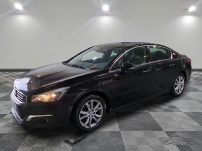 a picture of a black car parked in a garage