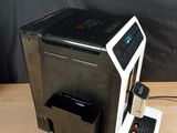a coffee machine that is sitting on a wooden table