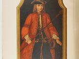 an open book with a picture of a man in a red coat