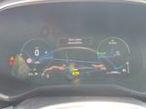 the dashboard of a car with a digital display on it