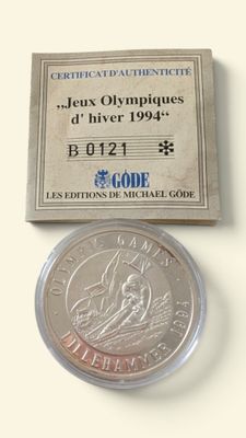 pièce de monnaie française comportant une inscription relative aux Jeux Olympiques et l'effigie d'un homme à cheval