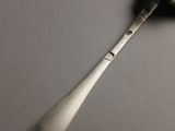 a toothbrush that is laying on top of a table