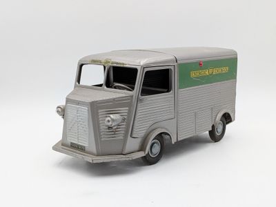 a toy truck that is sitting on a white surface