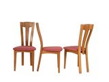 two wooden chairs with red upholstered seats on a white background