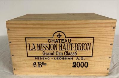 wooden box with label of chateau la mission haiti - brun grand cru classe