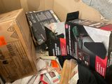 many boxes of items that are sitting on the floor