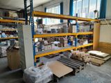 a large warehouse filled with lots of boxes and pallets