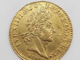 une pièce d'or portant le portrait d'un homme