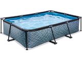 a large rectangular swimming pool with a metal frame and blue water