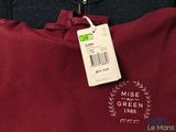 a red shirt with a price tag hanging on a hanger
