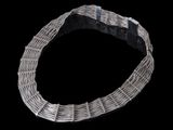 an image of a bracelet made out of silver wire