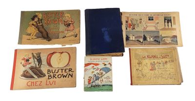 many books that are sitting on a white surface