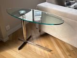 a glass table with a glass top in a living room