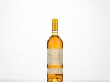 a bottle of white wine sitting on top of a table