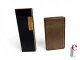 two lighters sitting next to each other on a white surface