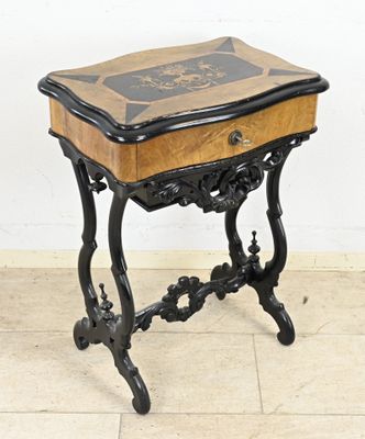 a small table with a book on top of it