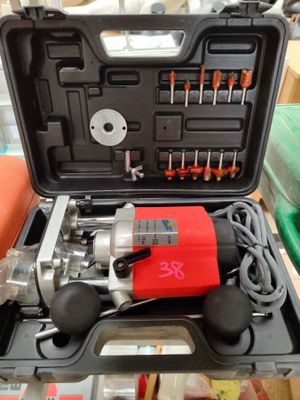a tool in the case that is sitting on top of a table