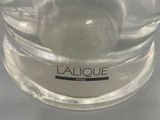 a close up of a glass bowl with a liquid inside of it