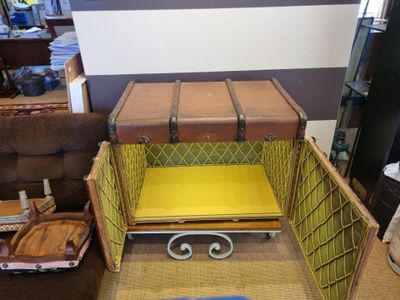 a suitcase that is sitting inside of a box