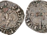 a silver coin with an image of a man on it