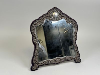 a mirror that is sitting on a table