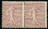 a pair of stamps with a woman on them