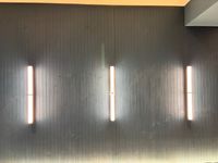 Neuf appliques murales doubles