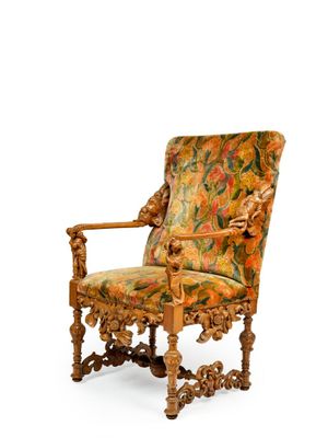 une image d'une chaise avec un dossier rembourré à motifs floraux