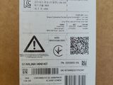 the back side of a box with a sticker on it