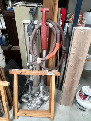 a picture of a room with a lot of clutter and tools