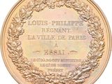 plaque of louis phillip ' s regiment in paris on the front of a medal