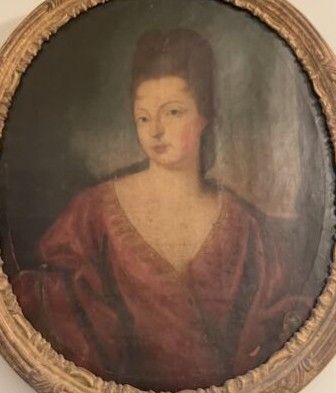 portrait of a woman in a red dress in a gold frame