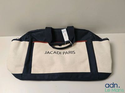 a white and blue bag sitting on top of a table