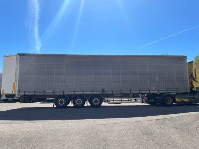 a large semi truck that is parked in a parking lot