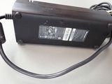 an image of a power supply that is plugged into a wall