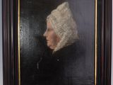 painting of a woman in a white bonnet in a dark wood frame