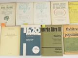 a lot of books that are on the table