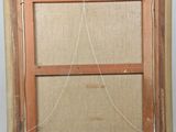 an old picture frame with a rope hanging from it ' s side