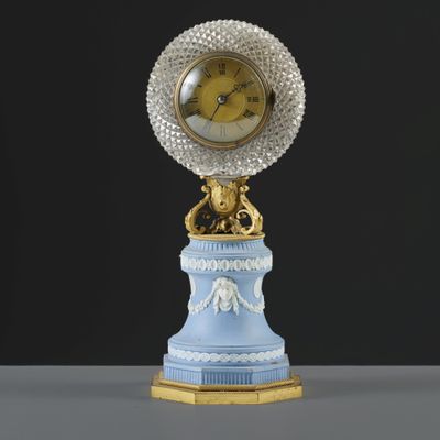 a clock that is sitting on top of a table