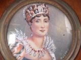 a picture of a woman wearing a tiara on a plate